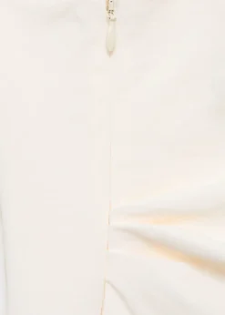 Long asymmetrical draped jumpsuit